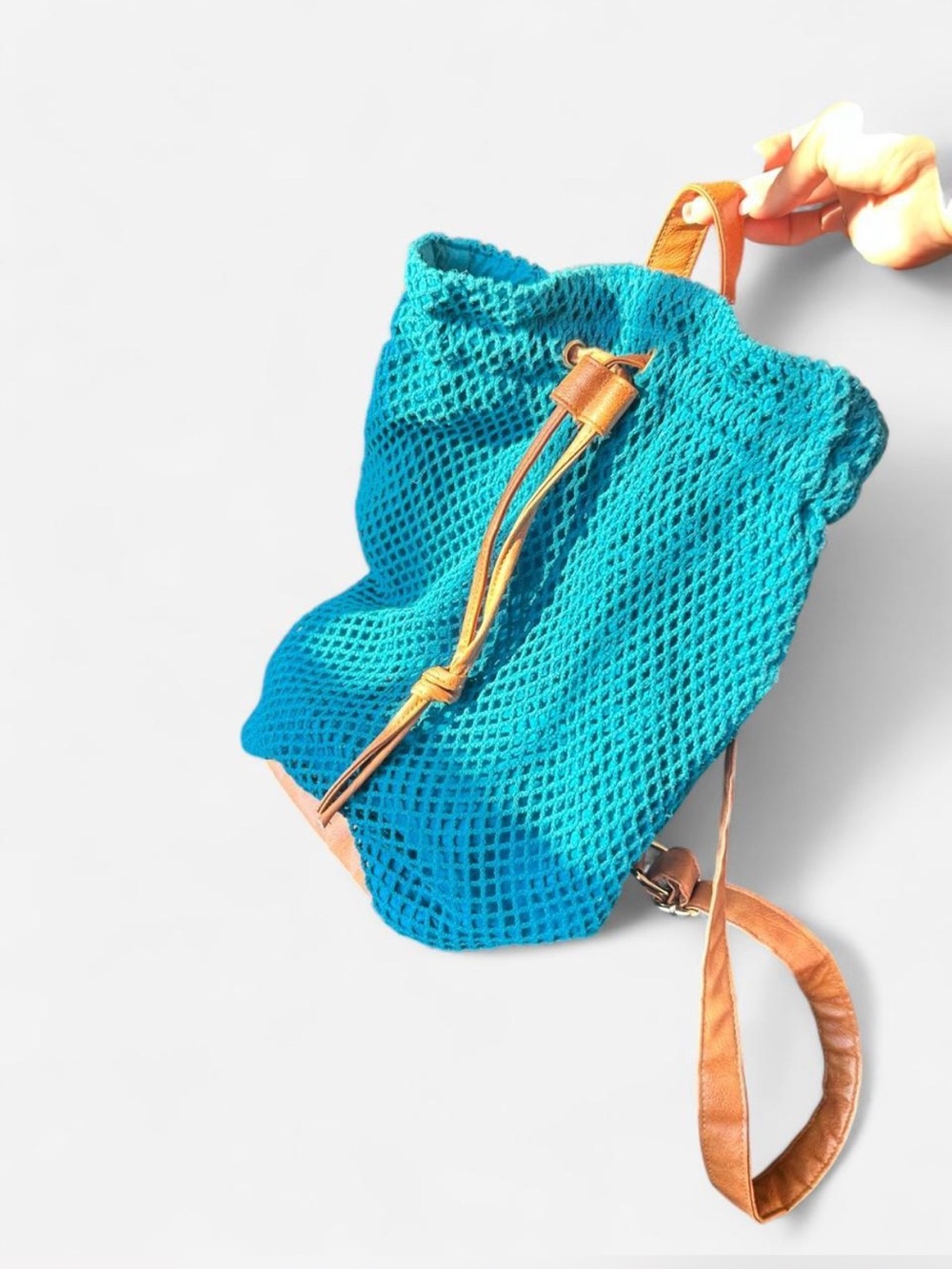 Chumbak- Turquoise Mesh Drawstring Backpack with Tan Leather Accents